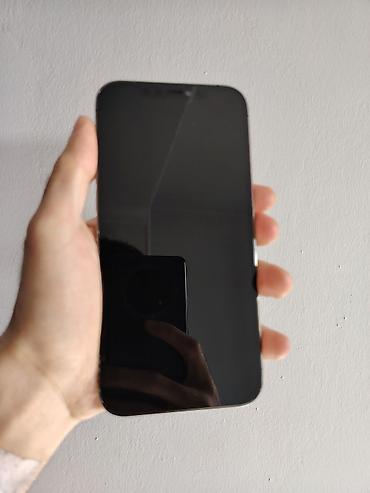 iphone 11 elde: IPhone 12 Pro Max, 128 GB, Pacific Blue, Simsiz şarj, Face ID — 6