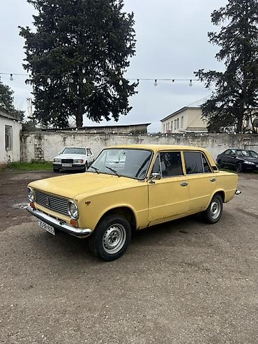VAZ (LADA): Model: VAZ 2101 “Jiquli” Kuzov: sedan, 4 qapı Rəng: sarı Ön-arkalı — 3