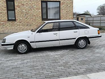 mini gps tracker: Toyota Camry: 1984 г., 2 л, Автомат, Бензин — 2