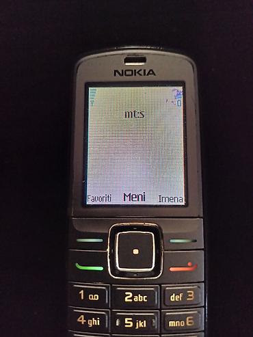 mali blender: Nokia klasični mobilni telefon sa fizičkom tastaturom - Model iz — 1