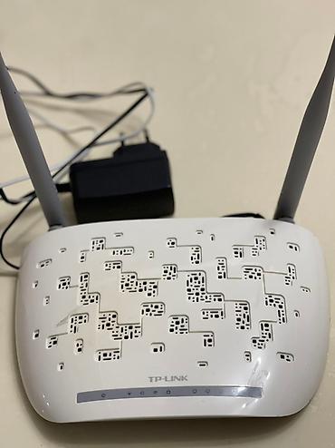 TP-Link Wi‑Fi router Xüsusiyyətlər: - İki ədəd yüksək qazanclı xarici