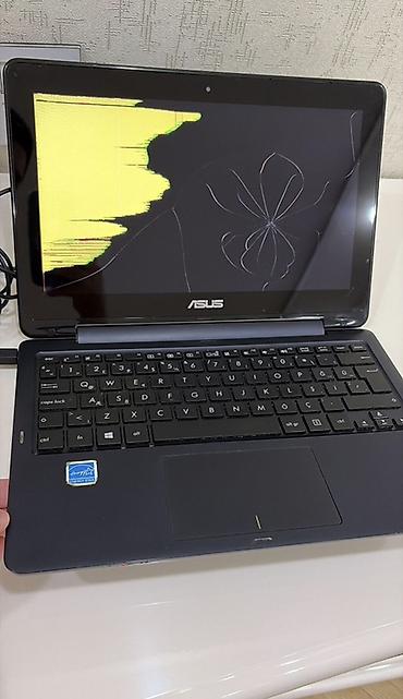 ASUS: ASUS TP-200S model qatlanabilən noutbuk. Ekran dokunmatikdi. İş və — 1