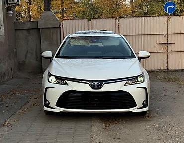 сиденье на рекс: Toyota Corolla: 2022 г., 1.8 л, Вариатор, Гибрид, Седан — 2