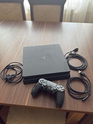 PlayStation 4 Slim oyun konsolu paketi Amerikadan bir başa bura gəlib
