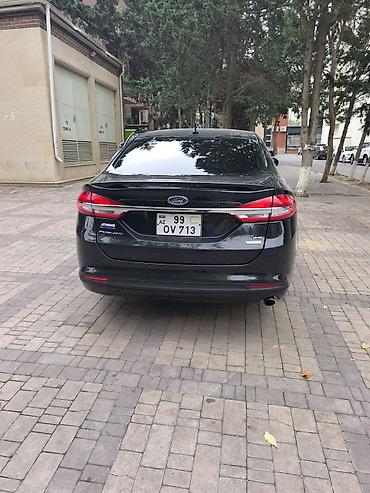 disk maşın: Ford Fusion sedan – qara rəng, modern və aerodinamik dizayn. 2017 — 5