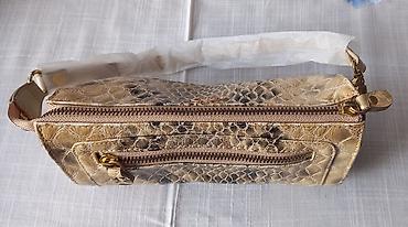 Çiyin çantası, İşlənmiş