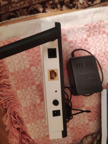 tp link fiber optic modem: Diqqət təcili cox qəşəng işlək TP- link.Adaptiru ilə birlikdə.Cox