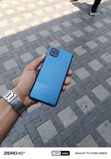 samsung tab a7 qiymeti: Samsung Galaxy A12, 64 ГБ, цвет - Синий, Кнопочный, Отпечаток пальца, Face ID
