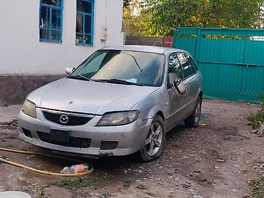 пороги демио: Mazda 323: 2001 г., 1.6 л, Механика, Бензин, Хэтчбэк — 6