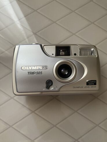 mini camera 69 azn: Olympus Camera.Veziyyeti yaxsidir.Retro kameradir.Icerisinde film