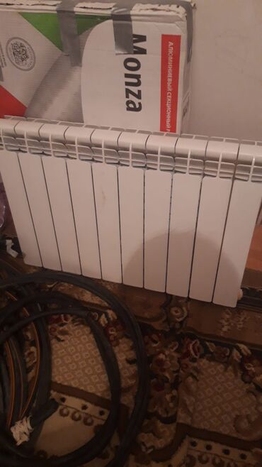 Radiatorlar: Yeni Seksiyalı Radiator Ünvandan götürmə