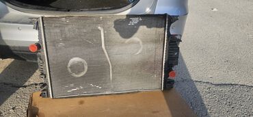 Qızdırıcı radiatorları: Ford fusion original radiator. Maşınım xarab olub rayonda qalmışam