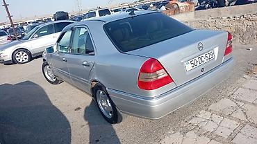 bugatti eb 112 6 mt: Mercedes-Benz C-Class sedan (W202), gümüş rəng. - Kuzov: 4 qapılı — 1