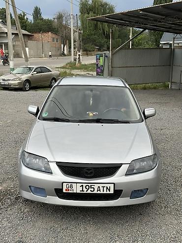 пороги демио: Mazda 323: 2001 г., 1.6 л, Механика, Бензин, Хэтчбэк — 2