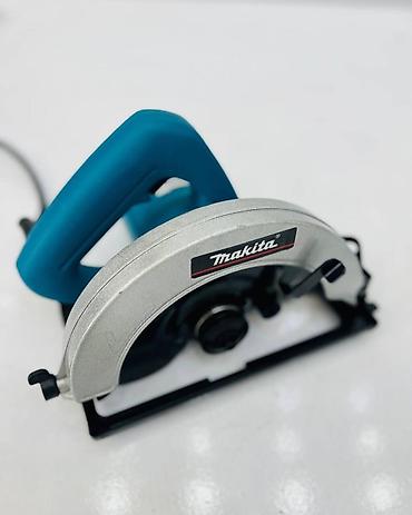 taxta mişarı: Makita 5806 dairəvi mişar - Disk ölçüsü: 185 mm (7") - Güc: 1050 W - — 4