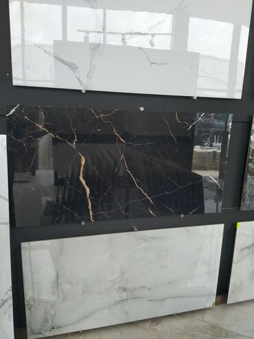 iran kafel metlax: Mərmər görünüşlü bu qara keramik plitə, qızılı damarları ilə fərqlənir