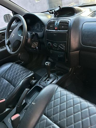 мисубиси спейс стар: Mitsubishi Space Star: 2003 г., 1.8 л, Автомат, Бензин, Хэтчбэк — 6