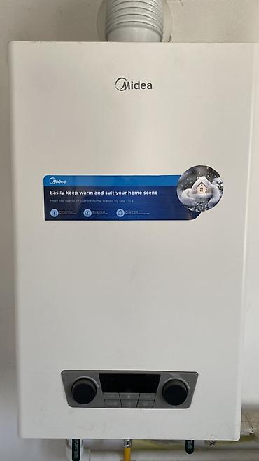 Продаю Газовый двухконтурный настенный котел Midea Площадь отопления -
