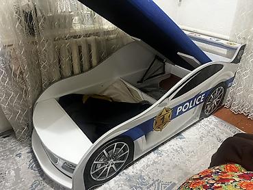 машинка на пульту: Детская кровать-машина «Police» с подъемным основанием и вместительным — 1