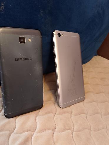 philips xenium x703: İki ədəd smartfon dəsti 1) Samsung smartfon - Arxa qapaqda “SAMSUNG” — 1