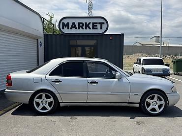 cls 63 amg: Mercedes-Benz C-Class: 2 l | 1994 il Sedan — 4