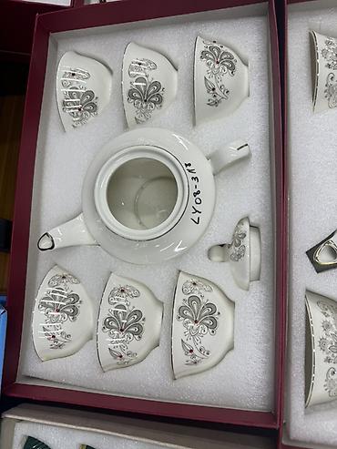 Наборы посуды: Чайные наборы из тонкого фарфора в подарочных боксах. Варианты: - — 9