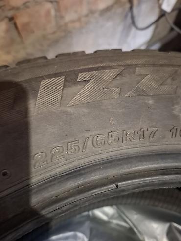 Шины: Bridgestone Blizzak DM-V2, комплект зимних шин без шипов (Studless) — 2