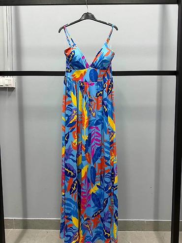 26: Letnja maxi haljina sa tropskim printom
2200 din 
S M L — 2