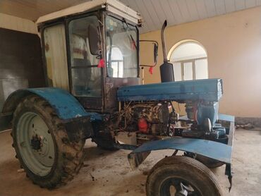 Traktorlar: Mavi rəngli kabinalı təkərli traktor - Güclü dizel mühərrik (şəkildə — 8