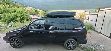 холодильник авто: Kia Carnival: 2000 г., 2.5 л, Автомат, Газ, Минивэн — 3