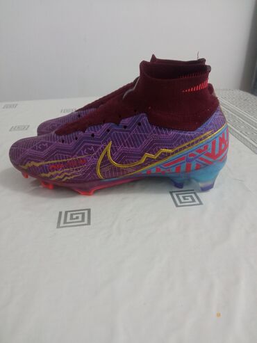 молтен мяч футбольный цена: Футбольные бутсы Nike Zoom Mercurial в ярких оттенках фиолетового