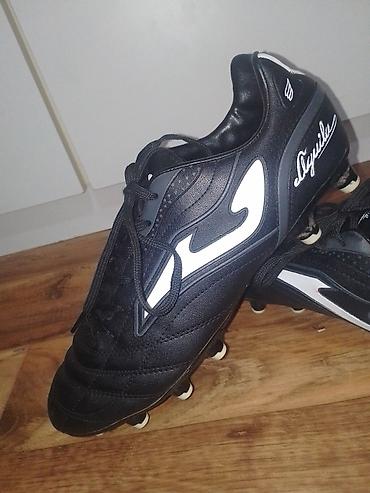 Kopačke: Kopačke Joma Aguila – crno‑bele - Model: Joma Aguila (logo i natpis — 4