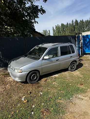 e 55 amg: Mazda Demio: 1997 г., 1.5 л, Автомат, Универсал — 7