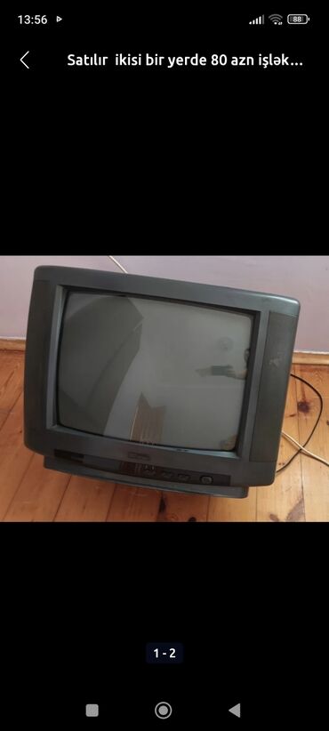 Bu televizor klassik dizaynlı, boz rəngdədir və elektronikanı