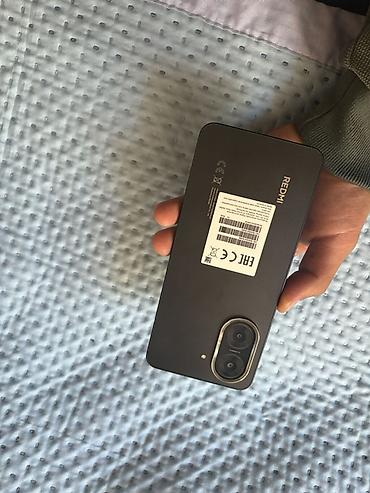 garmin forerunner 970: Смартфон Redmi (линейка Xiaomi) в тёмно‑сером цвете. Основные — 2