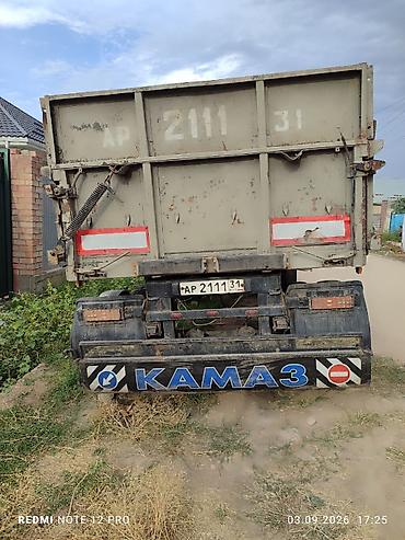 Самосвальный прицеп КАМАЗ. Двухосный прицеп с металлическим кузовом и
