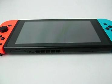 Nintendo Switch: Nintendo Switch V2 konzola u korektnom stanju, sa manjim tragovima — 7