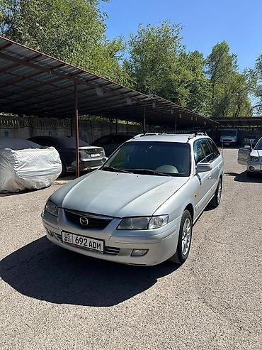 сузуки вогон р: Mazda Capella: 2002 г., 2 л, Механика, Бензин, Универсал — 1