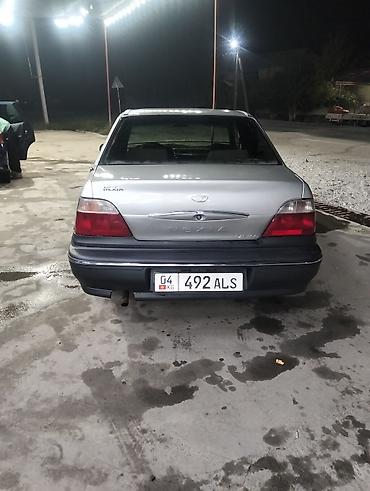 арзан машине: Daewoo Nexia: 2004 г., Кол менен иштөөчү, Бензин, Седан — 4