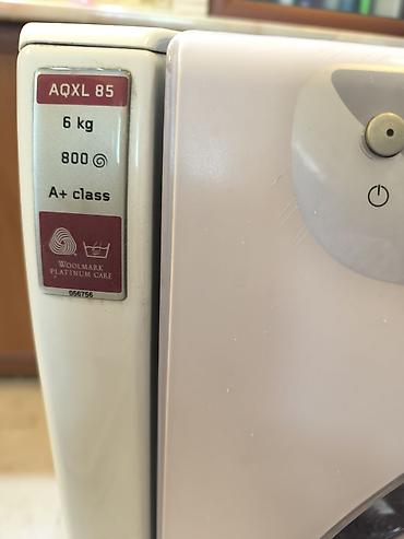 jack a4f: Стиральная машина Hotpoint-Ariston Aqualtis AQXL 85 - Фронтальная — 1