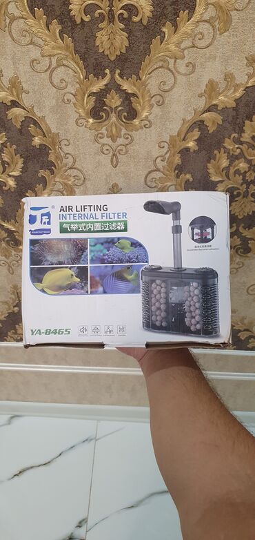 Akvarium aksessuar və ləvazimatları: Ağ rəngli silindrik korpusa malik akvarium xarici filtri. Qablaşdırma — 6
