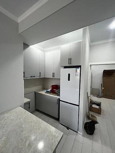 Кухонные гарнитуры: Кухонные гарнитуры на заказ - Современный минимализм: ровные фасады — 3