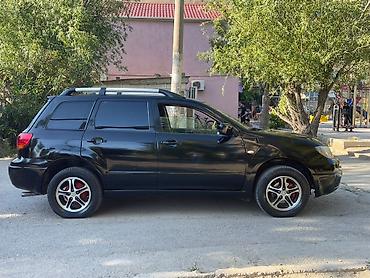 mitsubishi pikap: Mitsubishi Outlander, qara rəng, 5 qapılı krossover/SUV — 10