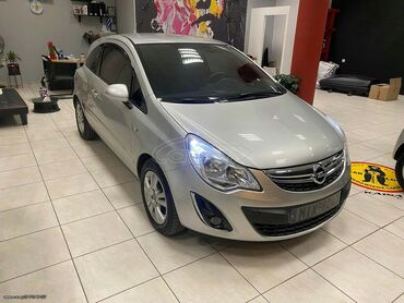 Transport: Opel Corsa: 1.2 l | 2011 year | 192000 km. Coupe/Sports