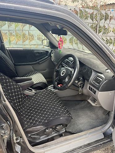 буфира: Subaru Forester: 2000 г., 2 л, Автомат, Газ, Универсал — 7