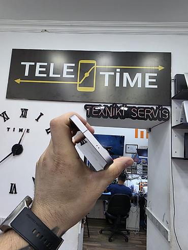 samsung 1207: Samsung Galaxy S25, 256 GB, rəng - Boz, Zəmanət, Barmaq izi, Simsiz şarj — 6