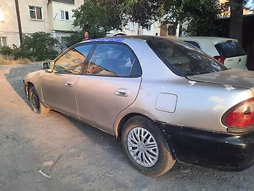 Транспорт: Mazda 323: 1997 г., 1.6 л, Автомат, Бензин — 4