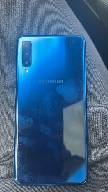 Samsung Galaxy A7 2018, 64 ГБ, цвет - Синий, Сенсорный, Отпечаток пальца, Две SIM карты