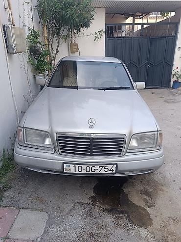 arxa kapot: Mercedes-Benz C 250: 2.5 l | 1994 il Sedan — 1