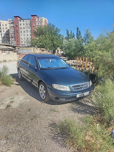 фольксваген поло л с: Opel Omega B sedan - Kuzov: 4 qapılı sedan, tünd yaşıl rəng - — 5
